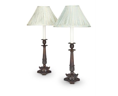 A PAIR OF MODERN PATINATED METAL CANDLESTICK LAMPS IN LOUIS PHILIPPLE STYLEFitted for electricity60cm high including shade an
