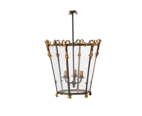 A REGENCY STYLE BRASS MOUNTED HEXAGONAL LANTERN20TH CENTURYOf tapering form with three light candle holder to the interior41c