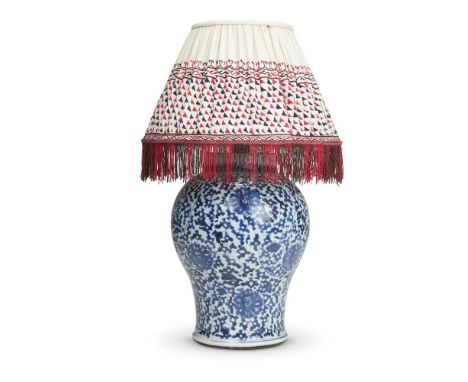 A CHINESE BLUE AND WHITE VASE KANGXIPainted with lotus flowers and scrolling foliage, altered as a lamp with Robert Kime shad