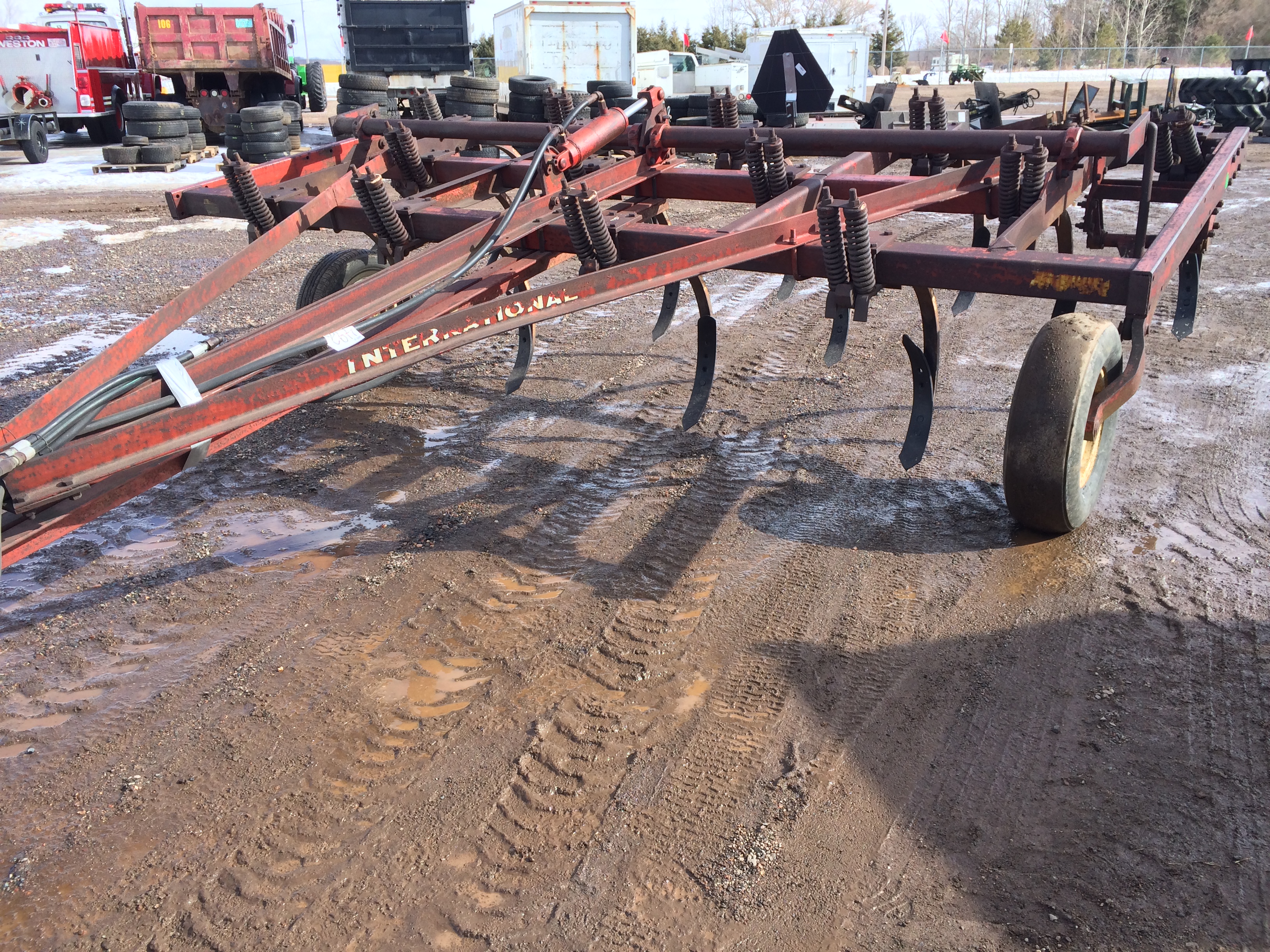 International Model 55 Chisel Plow, 13 shank, pull type.