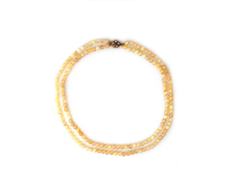 ****EASTIMATE SHOULD READ €1400-1800***An opal beaded necklace, composed of two strands of uniform size opals measuring 5mm, 
