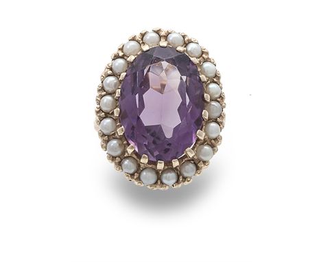 An amethyst and pearl ring, composed of an oval mixed-cut amethyst to a surround of pearls within an 9 carat gold setting, ri