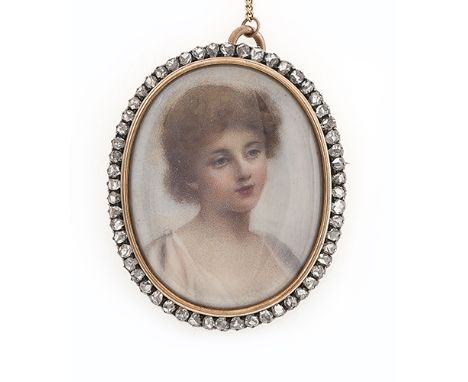  A 19th Century mourning pendant/brooch, the oval blue enamel plaque set with a spilt pearl star motif to centre to a surroun