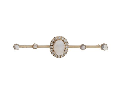 A late 19th Century diamond and moonstone brooch, composed of an oval rock crystal cabochon to an old round brilliant-cut dia