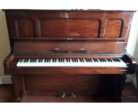 Steinway (c1926)A Model K upright piano in a fiddleback mahogany case.  This piano has been restored in the past.