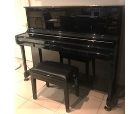 Kawai (c2010) A 122cm Model K-3 upright piano in a bright ebonised case; together with a stool.