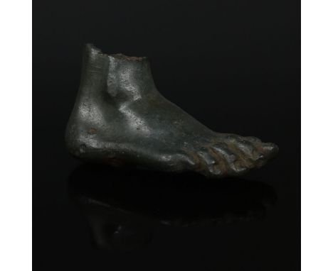 ITEM: Foot fragmentMATERIAL: BronzeCULTURE: RomanPERIOD: 1st - 2nd Century A.DDIMENSIONS: 25 mm x 50 mmCONDITION: Good condit