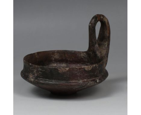 ITEM: KyathosMATERIAL: PotteryCULTURE: Villanovan / Early EtruscanPERIOD: 8th - 7th Century B.CDIMENSIONS: 85 mm x 95 mm x 11