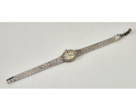 A Rotary 9ct. gold ladies' bracelet watch, manual movement, having signed oval textured dial with baton and quarterly Roman n