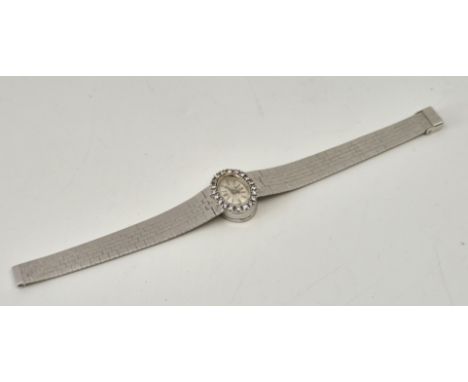 A 9ct. white gold Bueche Girod ladies' bracelet watch designed by Roy Cecil King, manual movement, having signed silvered ova
