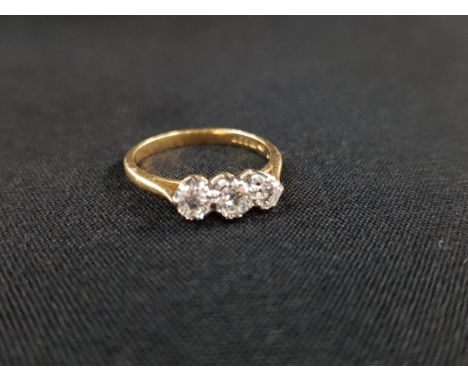 18 CARAT YELLOW GOLD 3 STONE DIAMOND RING WITH 0.50 CARAT OF DIAMONDS 