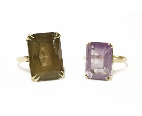 A 9ct gold single stone scissor cut smokey quartz ring, and a 9ct gold single stone emerald cut amethyst ringquartz 5.44gamet