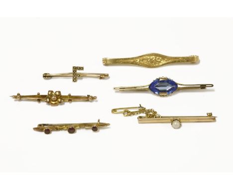A gold three stone garnet bar brooch, a gold single stone pearl bar brooch (pearl untested), a 9ct gold bar brooch with appli