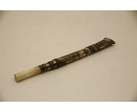 A 19th century Burmese white metal and ivory Dha knife and scabbard
