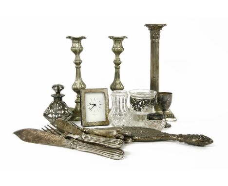 A silver candlestick, Sheffield 1913, and silver plated items, modern silver strut clock, etc