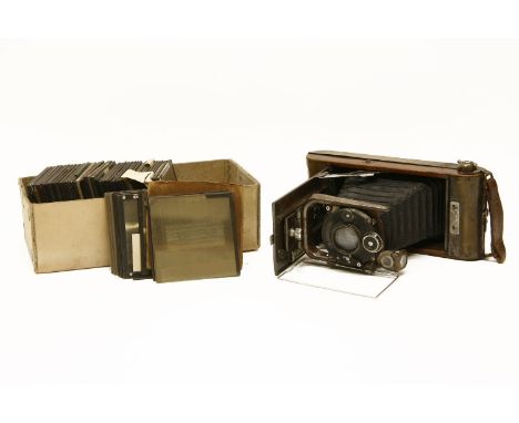 A. Houghton Butcher MFG Co. Ltd. No12 Ensign carbine Tropical camera, together with a quantity of photographic slides, and a 