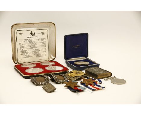 A set of four silver Montreal Olympics Silver coins together with WWII medals, early 19th C cut steel shoe buckles etc