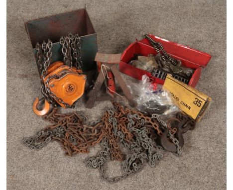 A quantity of assorted tools. Includes pulley and chain, jack, roller chains etc.  