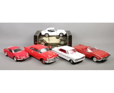 A collection of large scale model vehicles, to include boxed Burago Mercedes Benz SSKL (1931), Racing Champions Ford Thunderb