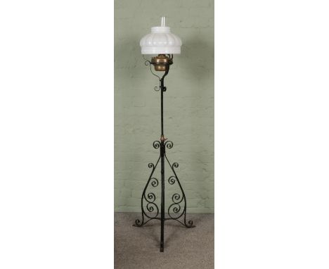 A Victorian oil lamp with opaque glass shade  