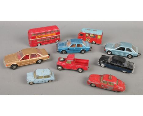 A quantity of vintage Corgi diecast vehicles. Includes Smith's Karrier Van, Morris Mini-Minor, Land Rover, Jaguar 2.4 Litre, 