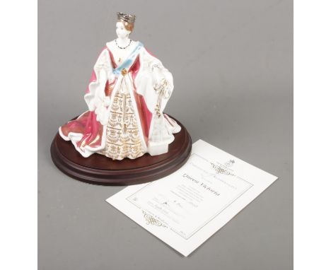 A limited edition Royal Worcester figure depicting Queen Victoria from the Queens of Britain collection. With original displa
