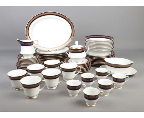 A Noritake Legacy Vienna dinner service including tea cups and saucers, sugar bowl, milk jug, gravy boat, dinner plates, plat