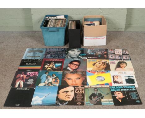 Two boxes and a box of LP and single records. Includes Bon Jovi, Michael Jackson, Status Quo, T-Rex, Elvis, Eric Clapton, etc