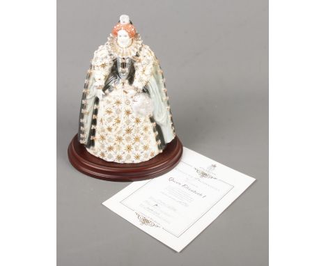 A Royal Worcester figure depicting Queen Elizabeth I from the Queens of Britain Collection. With original display base and ce