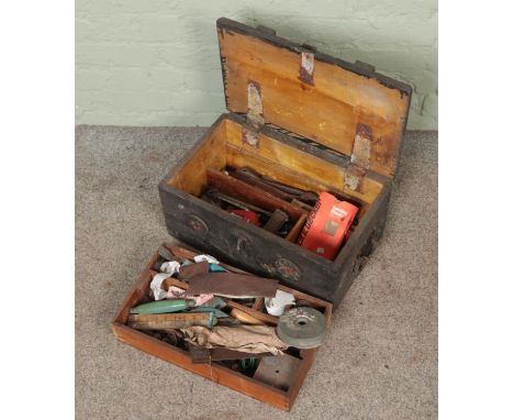 A vintage tool chest with contents of tools.  