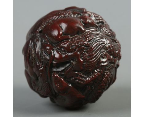 A spherical shaped netsuke. Depicting the 12 animals of the Chinese Zodiac.  