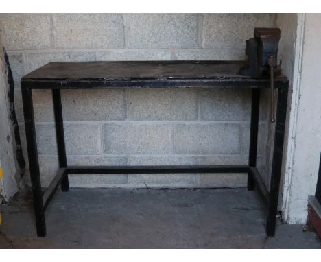 A steel work bench with mounted Record No.23 vice.  