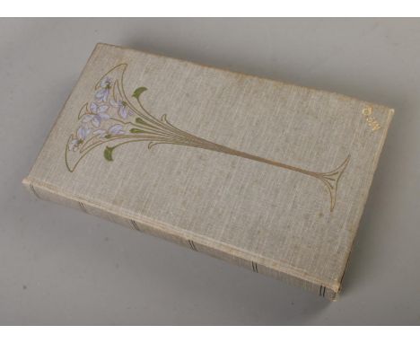 An Art Nouveau album with over 250 postcards  