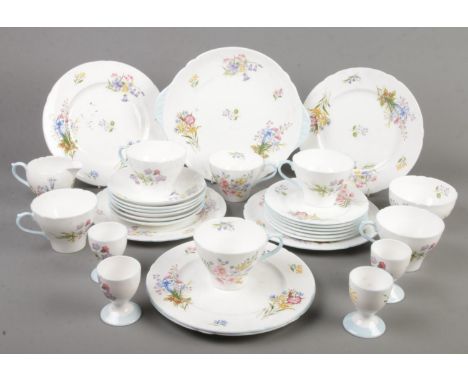 A collection of Shelley 'Wild Flowers' teawares. Includes cups &amp; saucers, egg cups, sandwich plate, etc.  