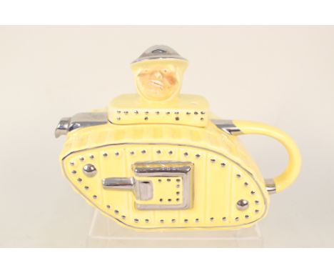 A ceramic teapot depicting a WWI tank with 'Tommy' lid, slight 'glaze crazing' but overall a fine example