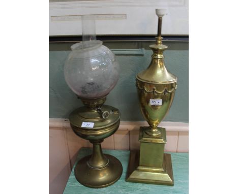 A brass oil lamp plus an urn shaped table lamp