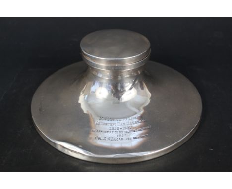 A silver capstan inkwell with inscription (as found)