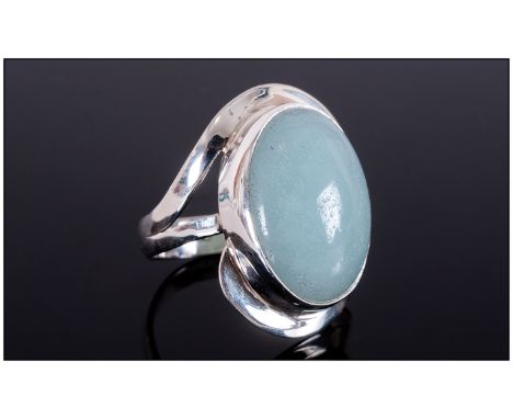 Russian Amazonite Hand Made Ring, a 15ct oval cabochon of aqua blue Russian amazonite set in a hand made sterling silver moun