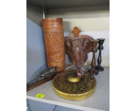 A Chinese carved cylindrical formed vase, together with an Indian model of a lion on a treen base purchased from Shelley &amp