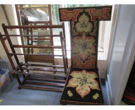 A prayer chair with tapestry seat and back, together with a mahogany towel rail 