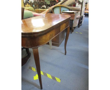 An early 20th century mahogany fold over card table on cabriole legs A/F 