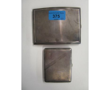 Two silver cigarette cases with engine turned decorationLocation: CAB 