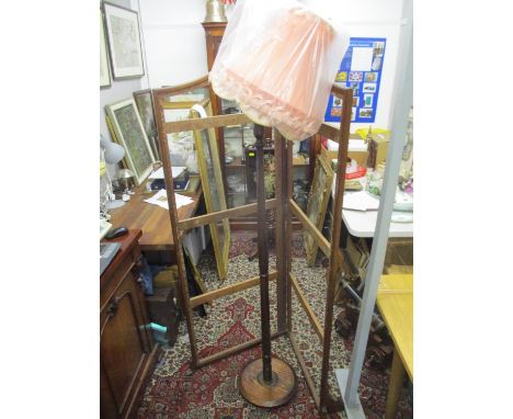 An oak standard lamp, shades and a mahogany three fold screen 