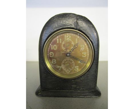 A Birch &amp; Gaydon Ltd WWI period travel alarm clock, brass cased in a leather clad, wooden case, made by The Zenith Watch 