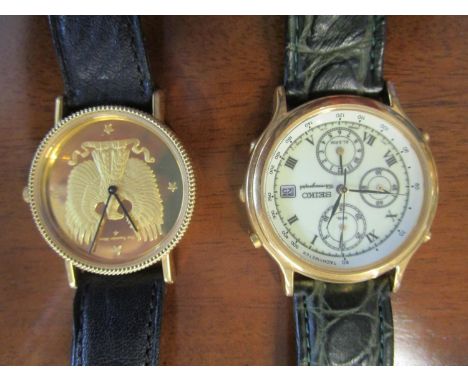 A Seiko 7T32 6B40 chronograph watch with date calendar at 3, on leather strap and a Franklin Mint Eagle wristwatch 