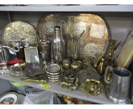 A quantity of silver plate and mixed metalware to include a cocktail shaker, two trays, a pair of silver plated dwarf candles