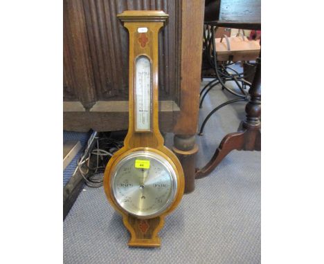 A 20th century Harrods Ltd walnut framed banjo wall barometer 