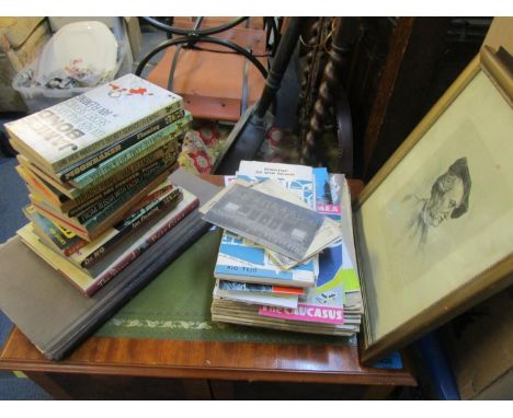 A mixed lot to include Ian Fleming's James Bond early edition paperback books circa 1960's, various postcards and ephemera, a