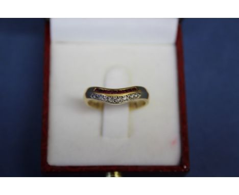 An 18ct gold ring set ruby and diamonds.  Condition Report: Ring size O/P 4g total