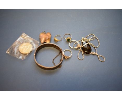 A silver engraved bangle; together with a collection of other jewellery items.
